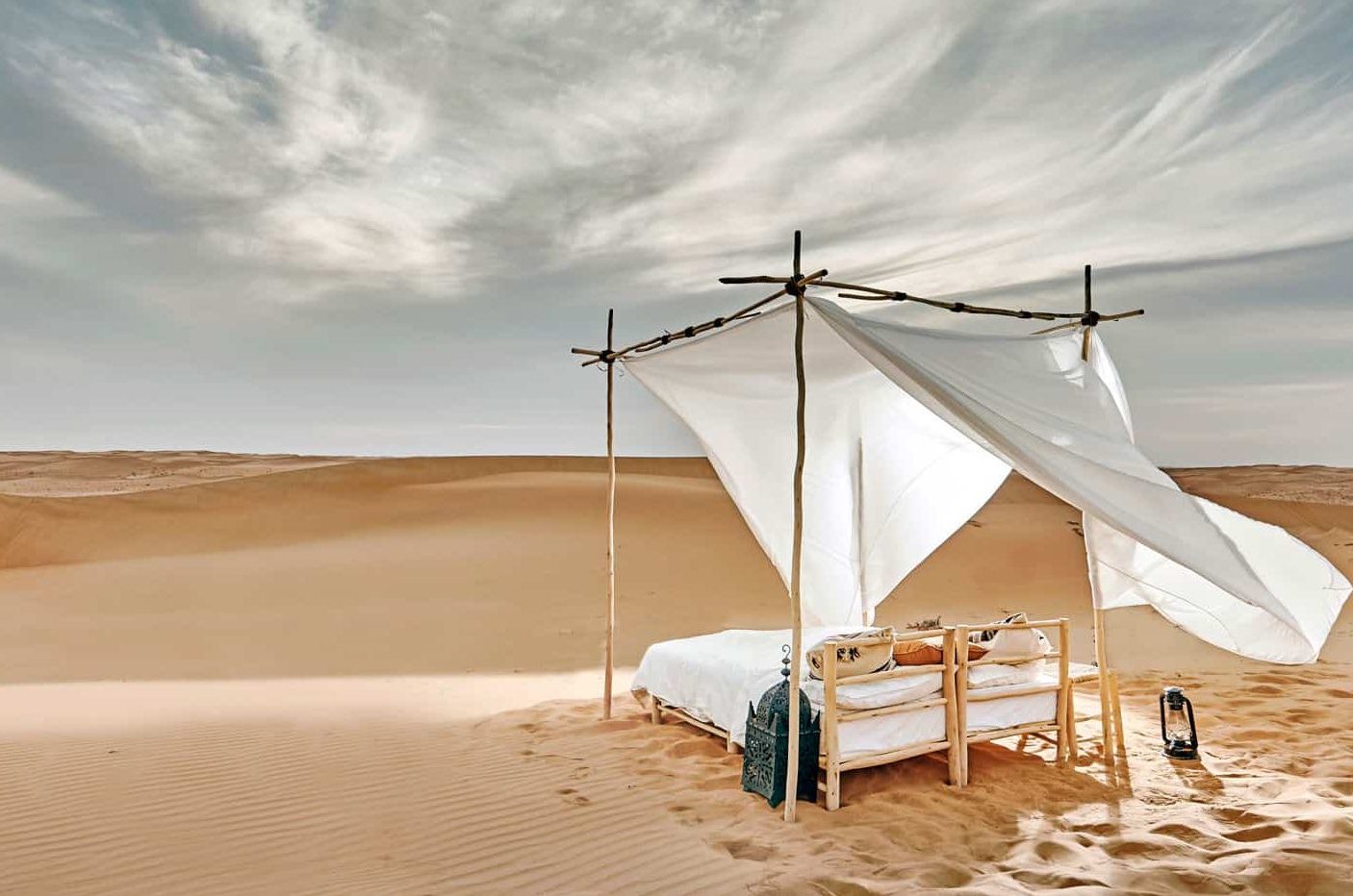 Camp privé désert Oman lit désert